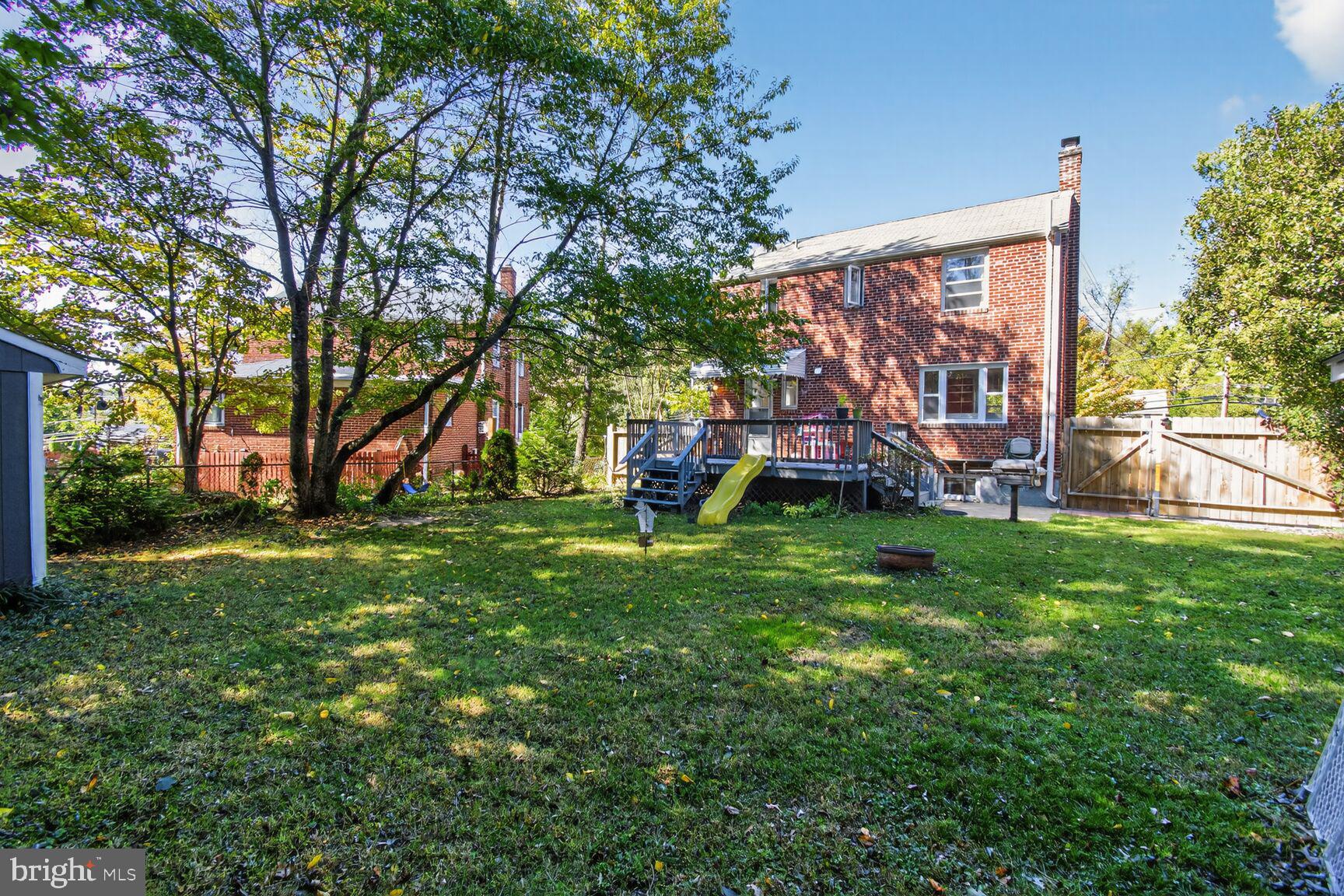 10021 Tenbrook Drive Silver Spring, MD 20901 - Photo 21 of 21 a view of a park with large trees