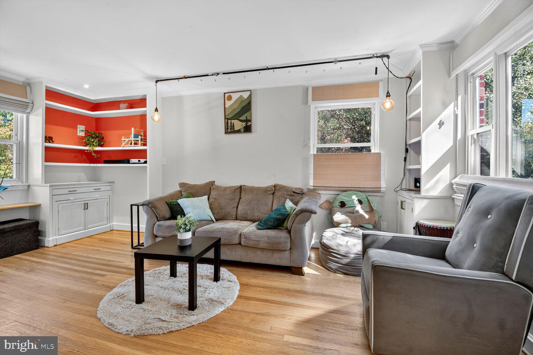 10021 Tenbrook Drive Silver Spring, MD 20901 - Photo 5 of 21 a living room with furniture and a large window