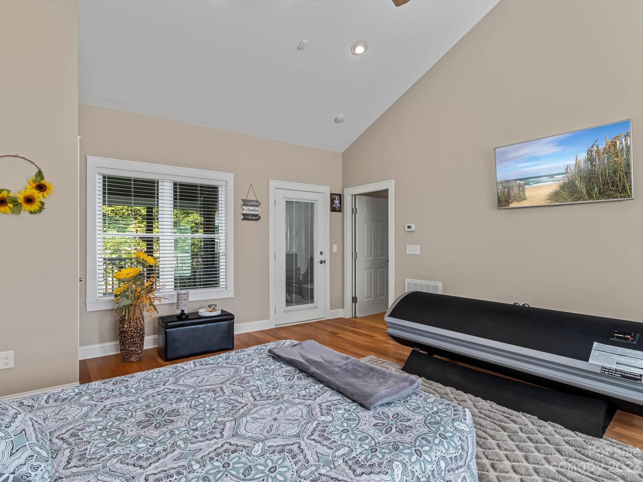 125 Boulder Ridge Drive State Road, NC 28676 - Photo 16 of 39 a bedroom with a bed and a window