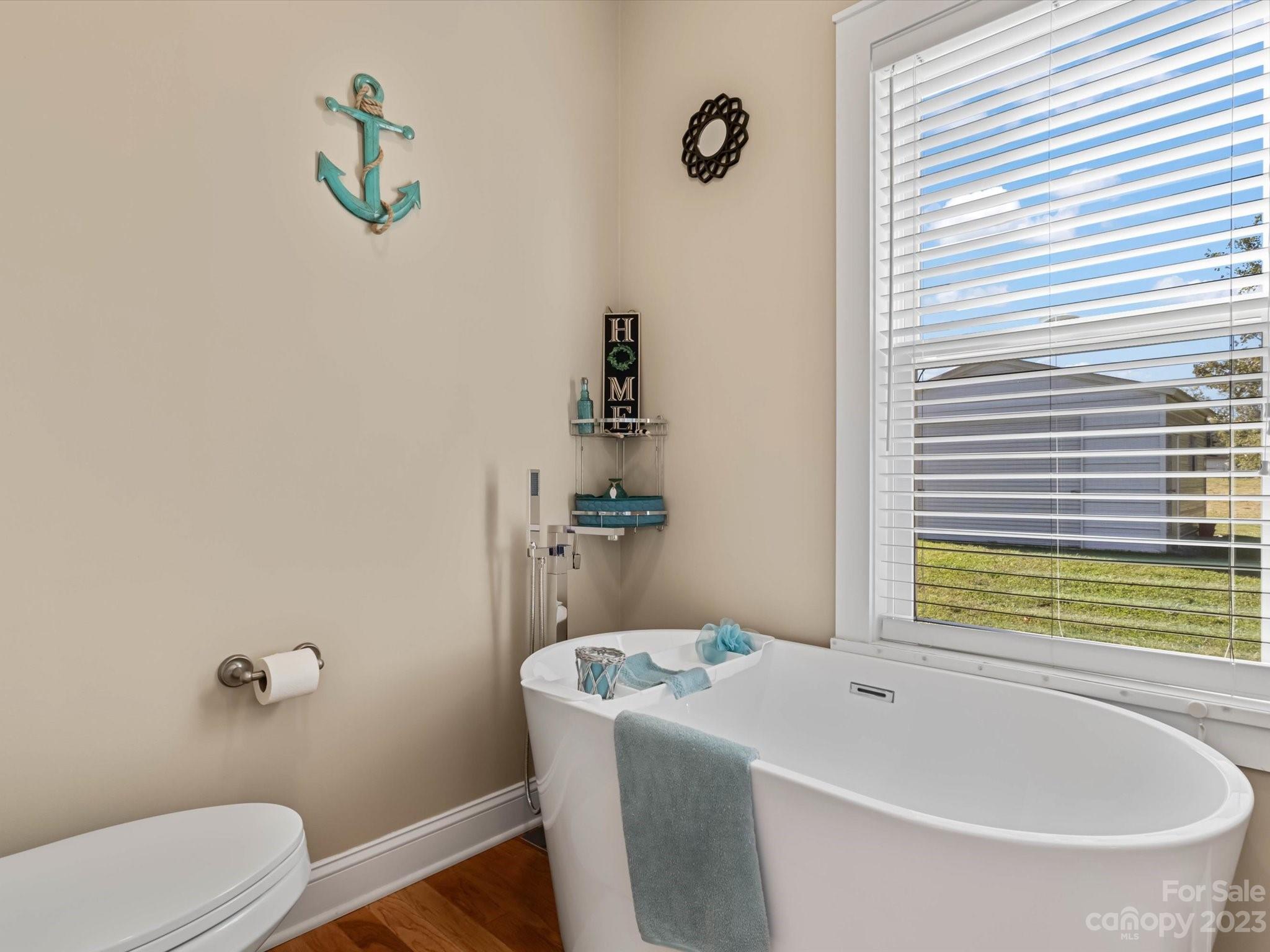 125 Boulder Ridge Drive State Road, NC 28676 - Photo 17 of 39 a bathroom with a sink and bathtub