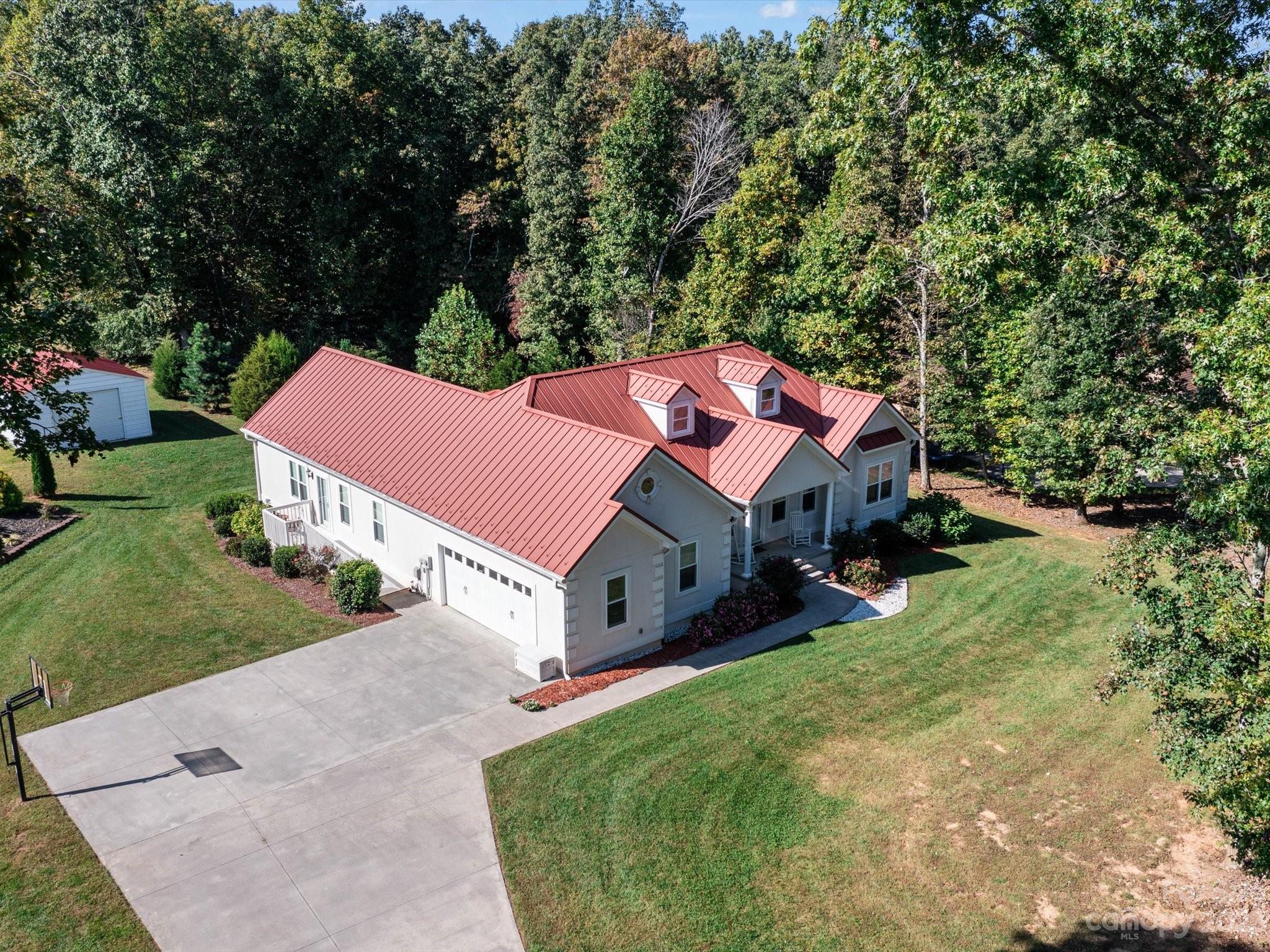 125 Boulder Ridge Drive State Road, NC 28676 - Photo 29 of 39 an aerial view of a house