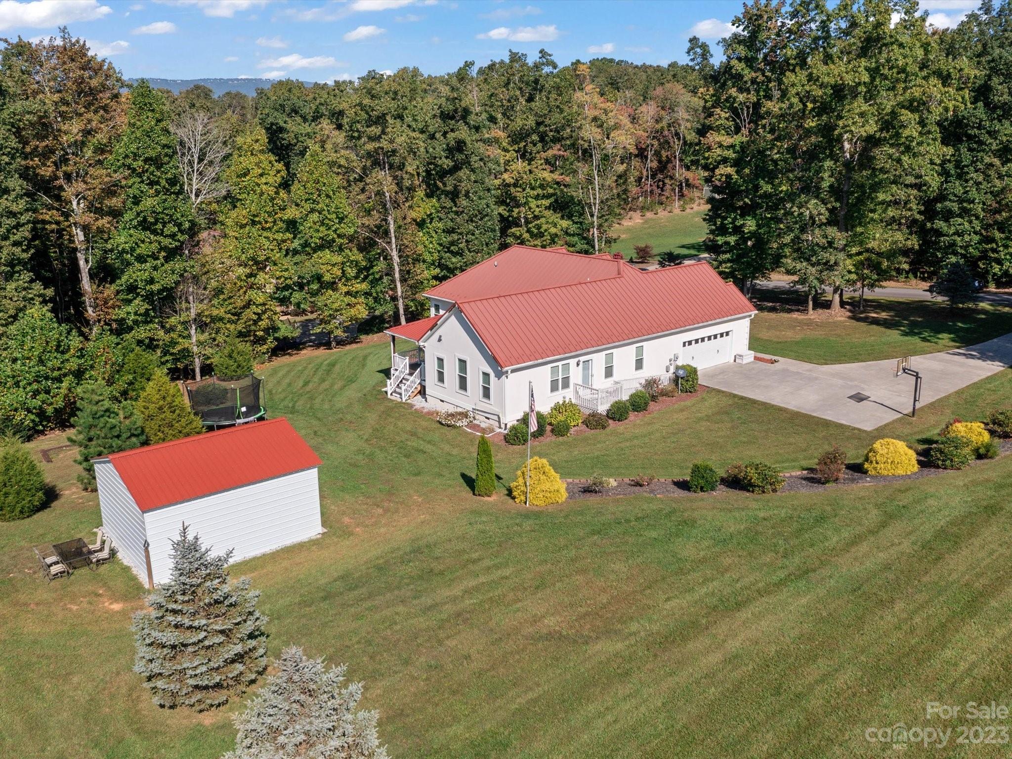 125 Boulder Ridge Drive State Road, NC 28676 - Photo 31 of 39 an aerial view of residential houses with outdoor space