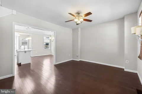 a kitchen with stainless steel appliances a stove a sink and a refrigerator