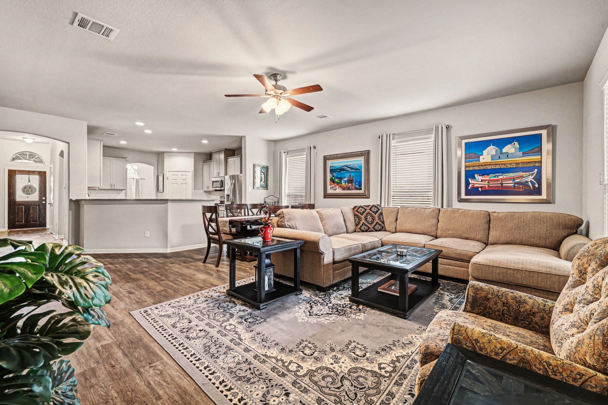 320 Red Maple Lane Conroe, TX 77304 - Photo 10 of 27 a living room with furniture and a view of kitchen
