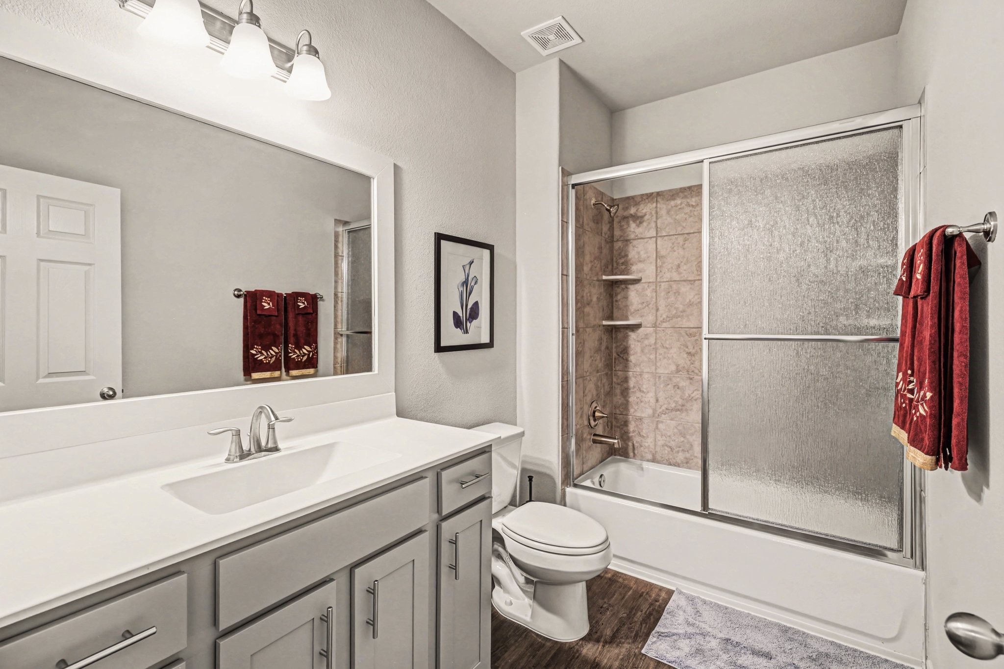 320 Red Maple Lane Conroe, TX 77304 - Photo 18 of 27 a bathroom with a sink toilet and shower