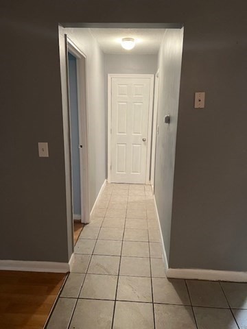 110 Boston Post Road East, Unit 4 Marlborough, MA 01752 - Photo 11 of 13 a view of a hallway