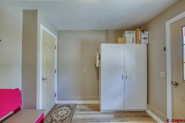 a view of livingroom with furniture and a window