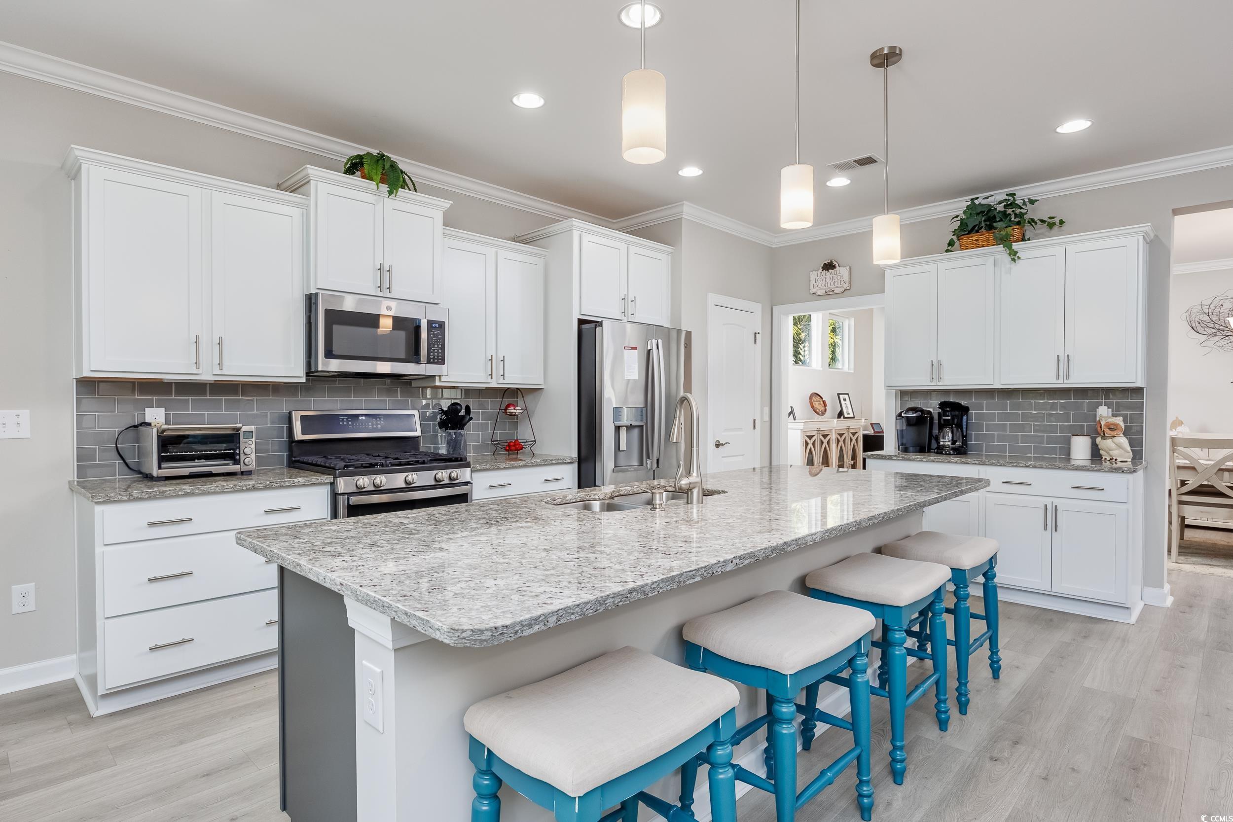 311 Switchgrass Loop Little River, SC 29566 - Photo 13 of 38 Kitchen with appliances with stainless steel finis