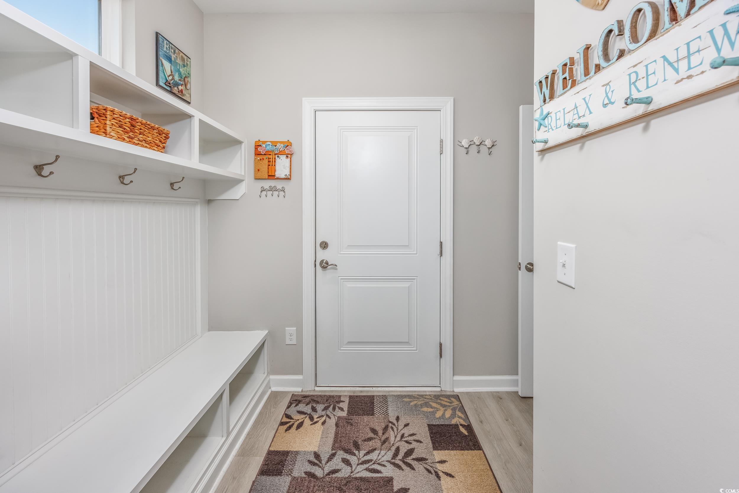 311 Switchgrass Loop Little River, SC 29566 - Photo 14 of 38 Mudroom with light hardwood / wood-style flooring