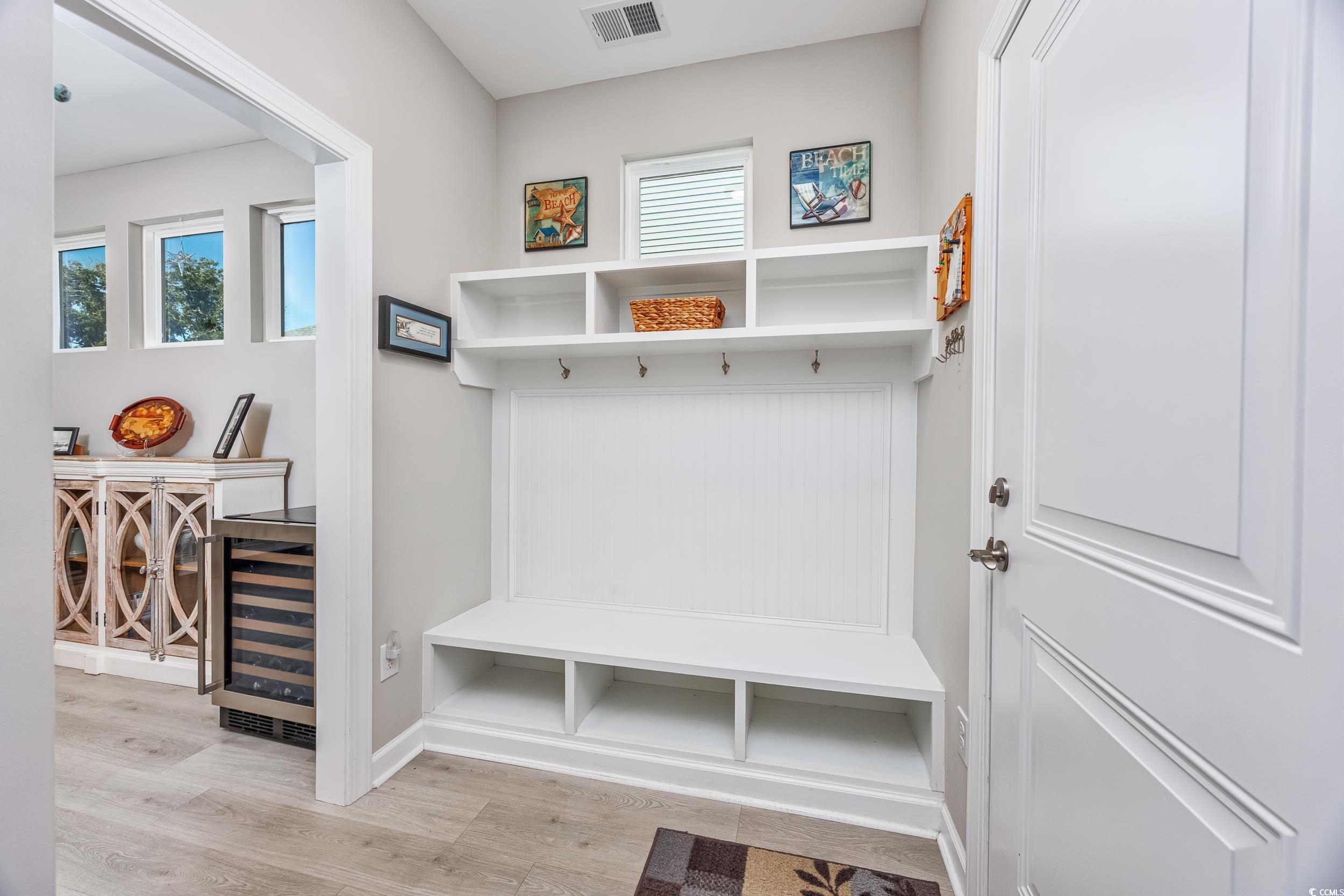311 Switchgrass Loop Little River, SC 29566 - Photo 15 of 38 Mudroom with light hardwood / wood-style floors an