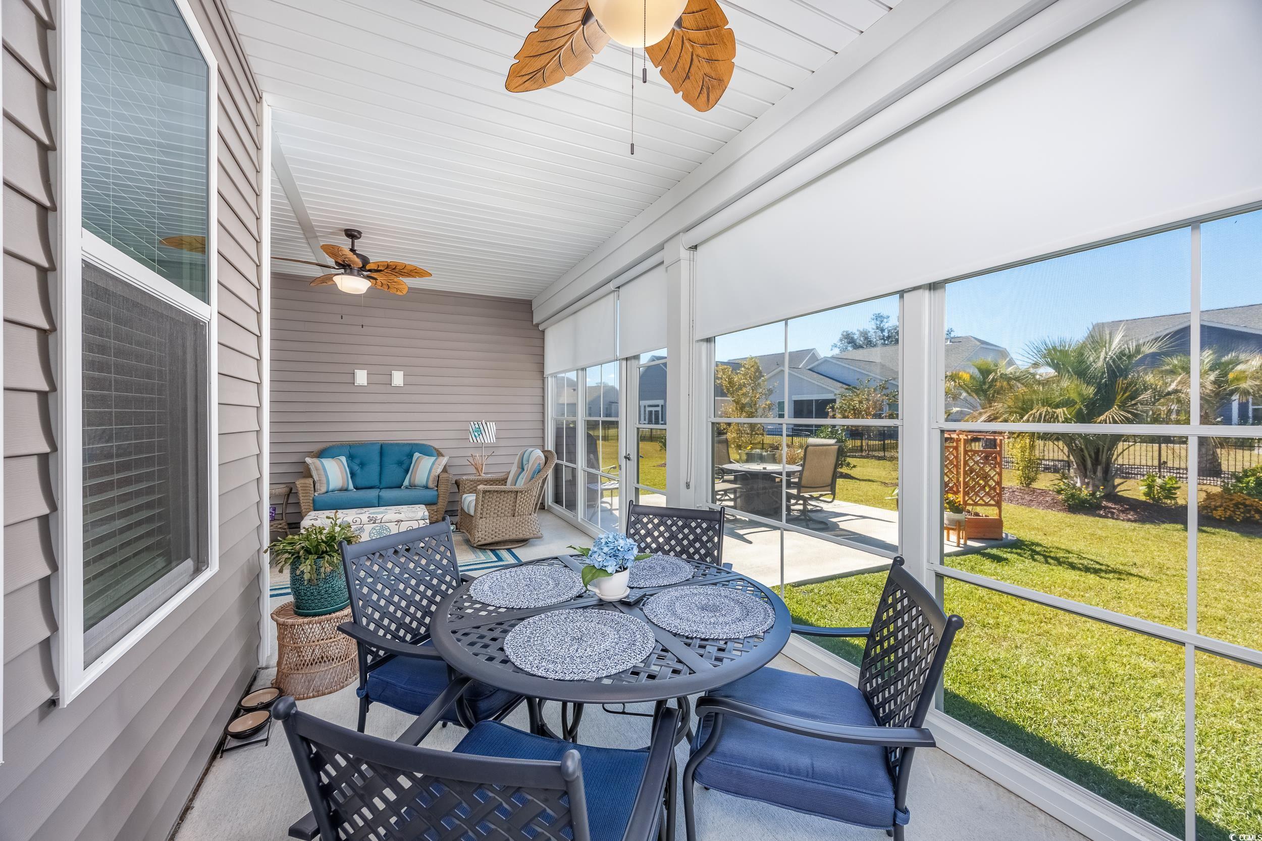 311 Switchgrass Loop Little River, SC 29566 - Photo 24 of 38 Sunroom featuring ceiling fan