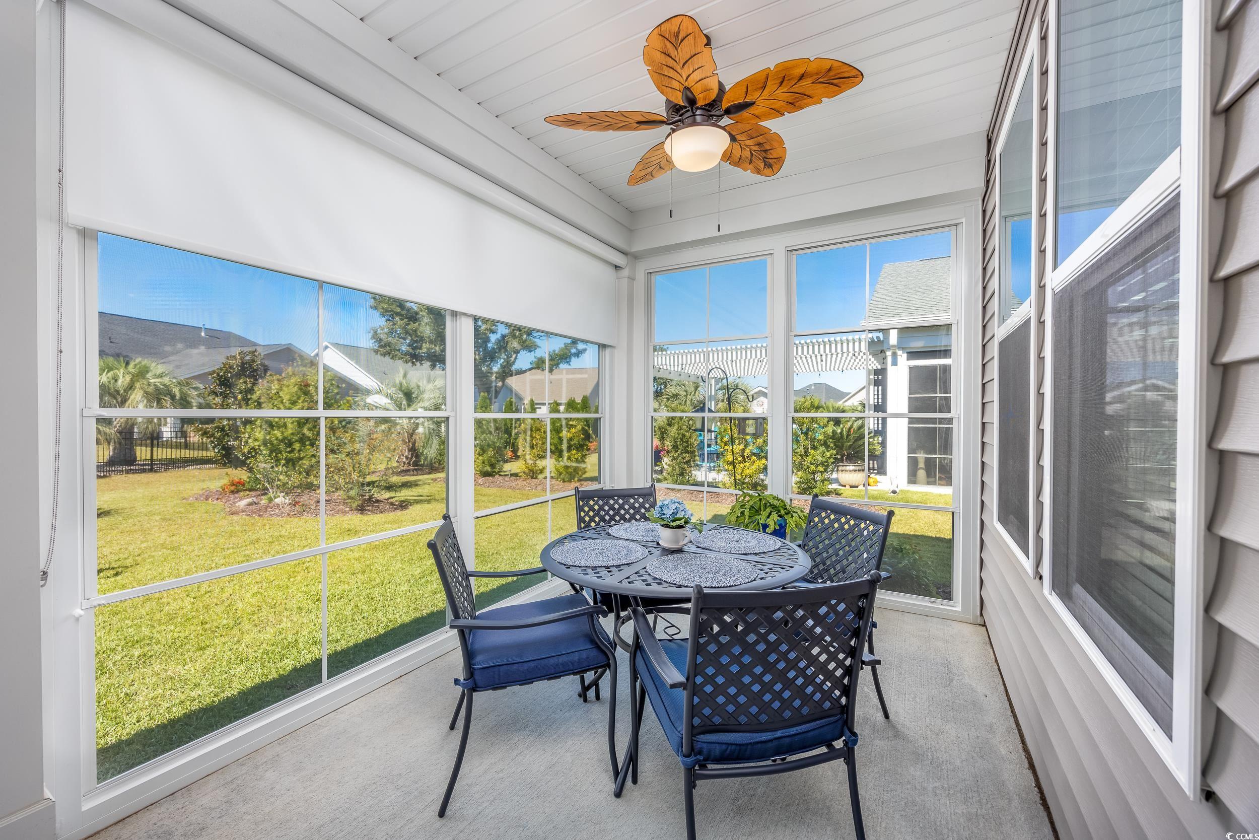 311 Switchgrass Loop Little River, SC 29566 - Photo 25 of 38 Sunroom with wood ceiling, a healthy amount of sun