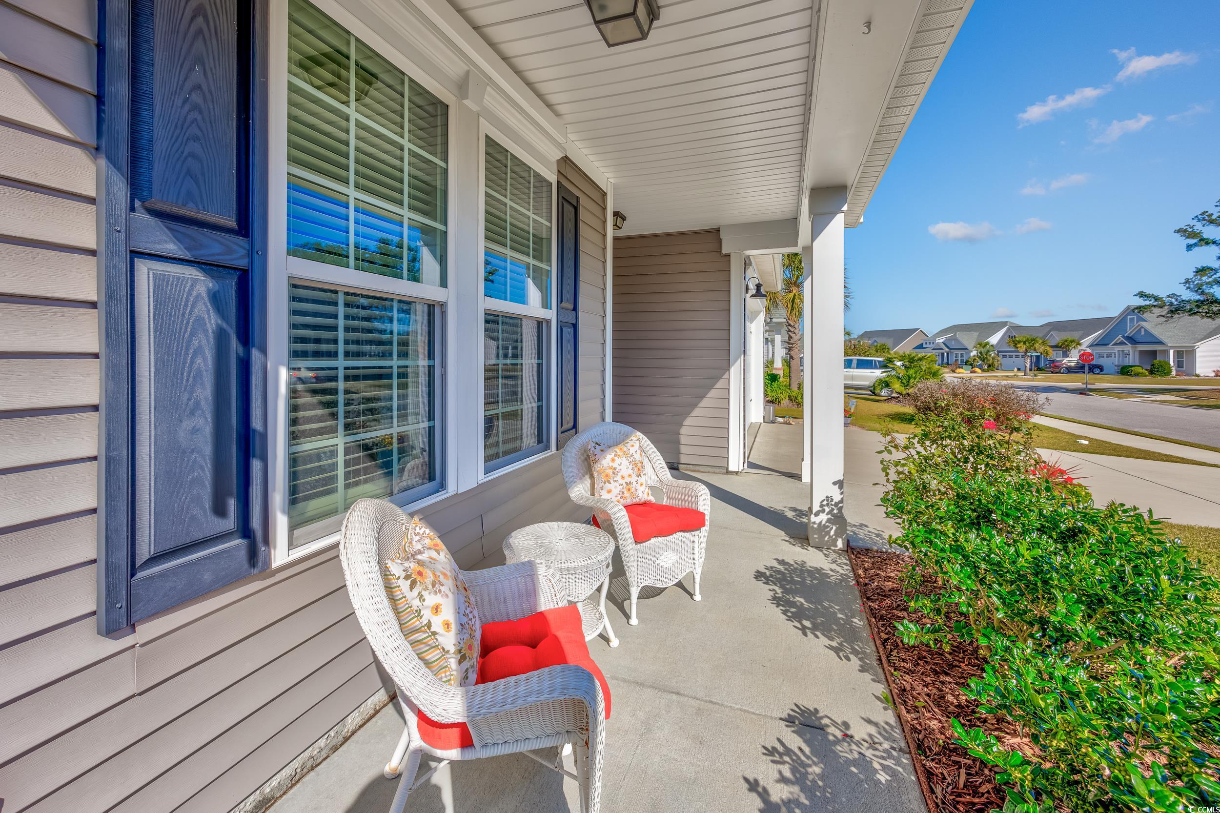 311 Switchgrass Loop Little River, SC 29566 - Photo 5 of 38 View of patio featuring covered porch