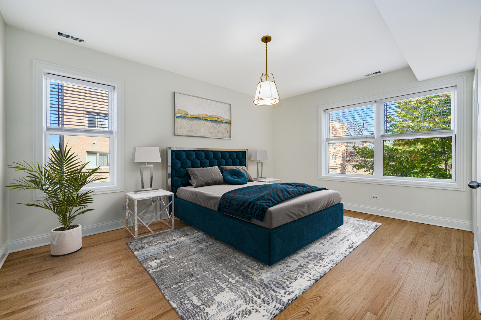 1544 West Sherwin Avenue, Unit 2N Chicago, IL 60626 - Photo 9 of 19 a bedroom with a bed and a potted plant