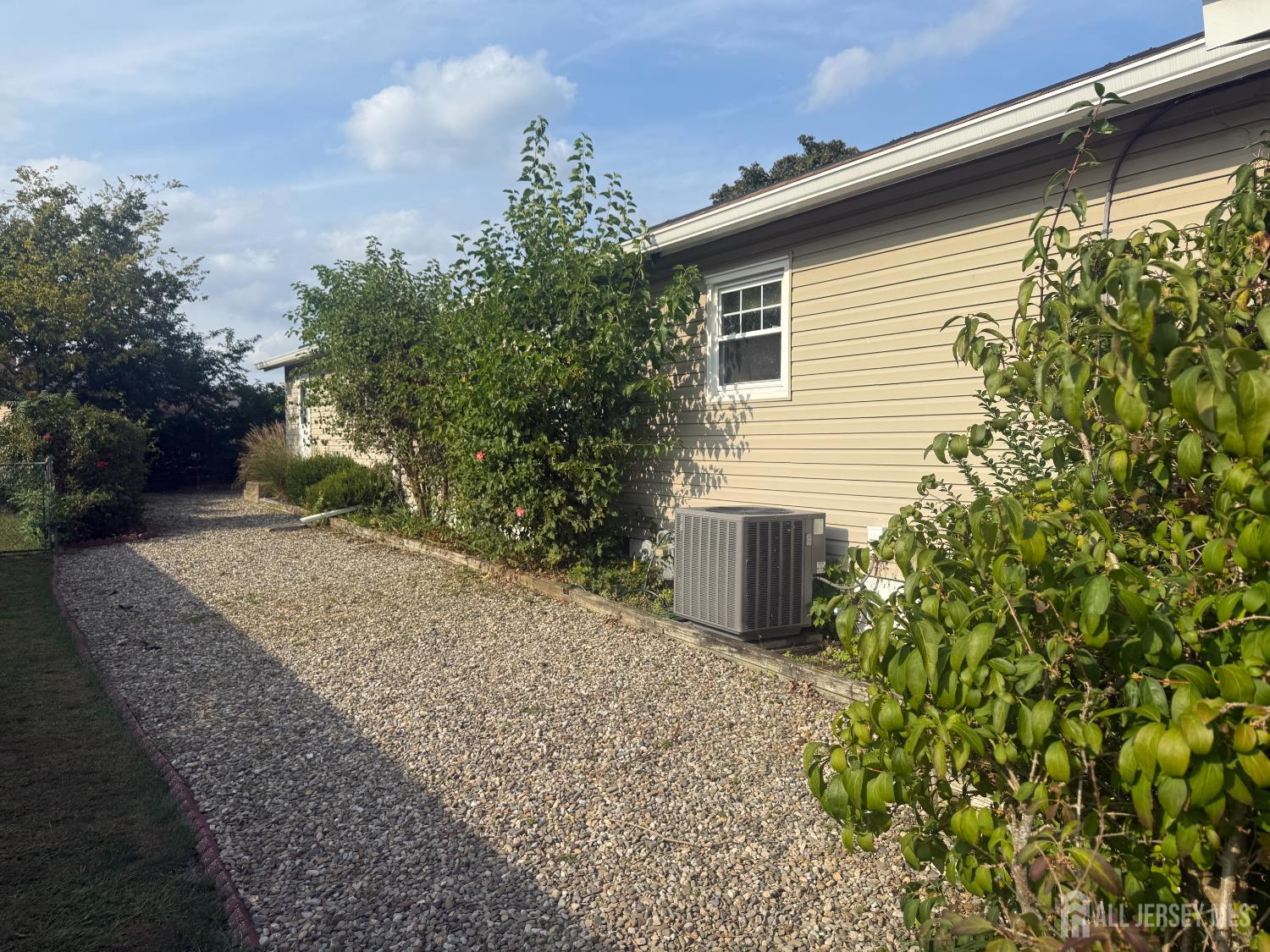 42 Boulevard East Old Bridge, NJ 07735 - Photo 14 of 14 a view of a house with a yard and plants