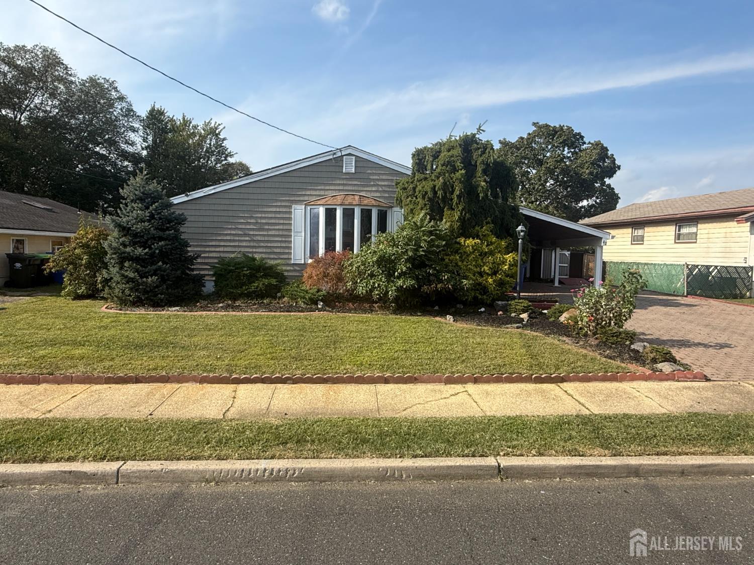42 Boulevard East Old Bridge, NJ 07735 - Photo 2 of 14 a front view of a house with a yard