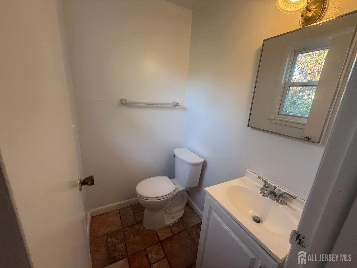 42 Boulevard East Old Bridge, NJ 07735 - Photo 8 of 14 a bathroom with a sink and a toilet