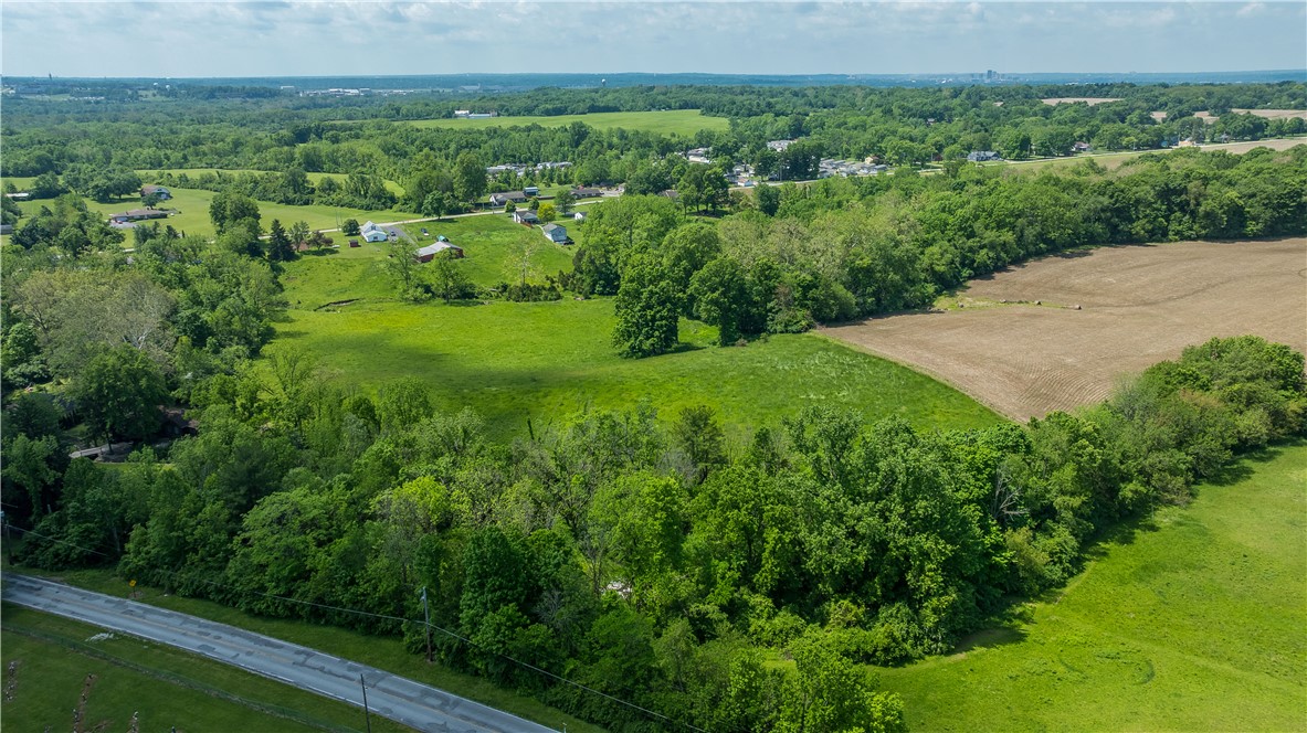 4617 Bath Road Dayton, OH 45424 - Photo 4 of 8 Discover vast, rolling acreage offering pastoral views and expansive development potential.
