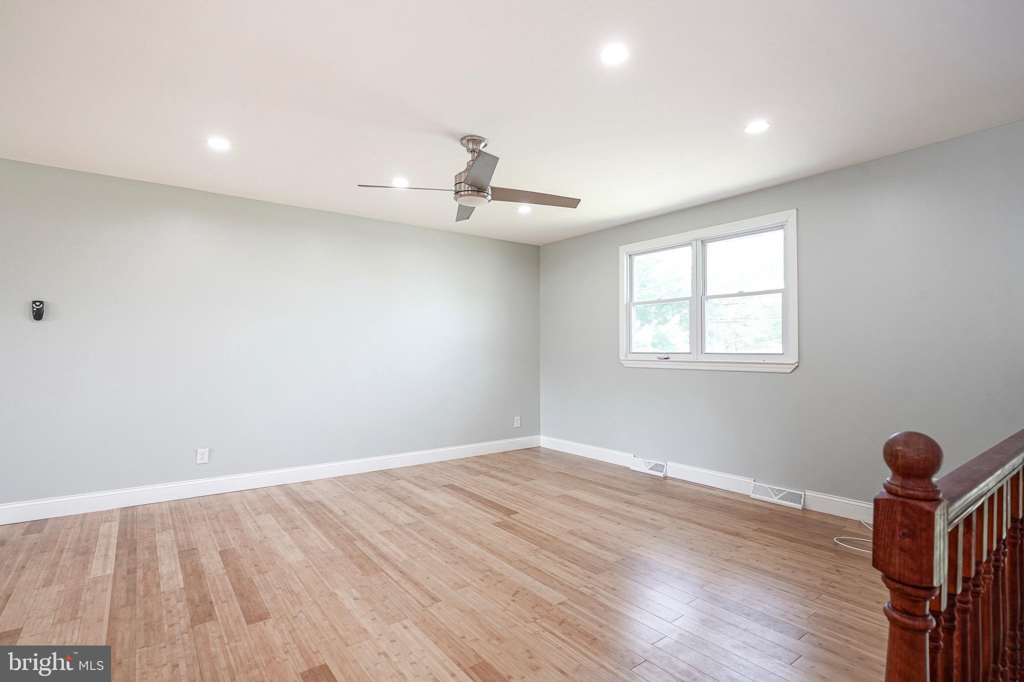 232 Egg Harbor Road Sewell, NJ 08080 - Photo 11 of 36 a view of empty room with wooden floor and fan