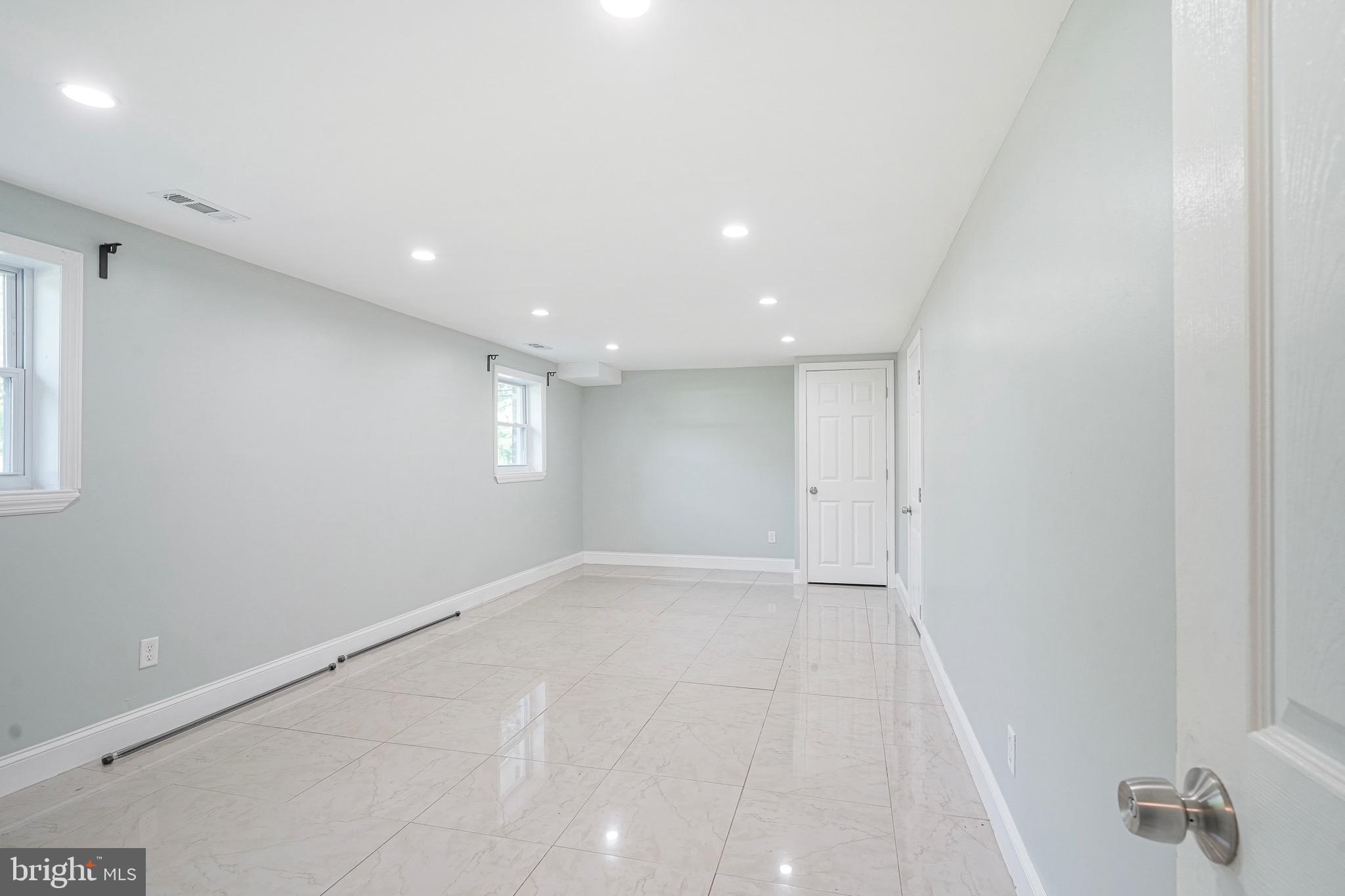 232 Egg Harbor Road Sewell, NJ 08080 - Photo 16 of 36 an empty room with windows