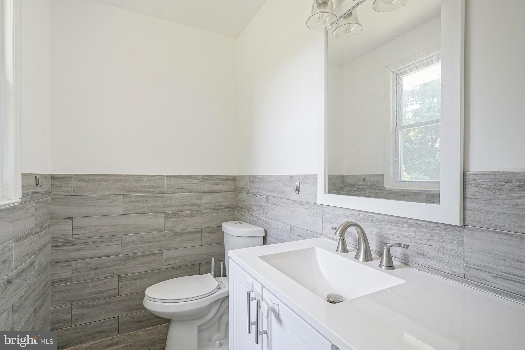 232 Egg Harbor Road Sewell, NJ 08080 - Photo 22 of 36 a bathroom with a sink and a toilet