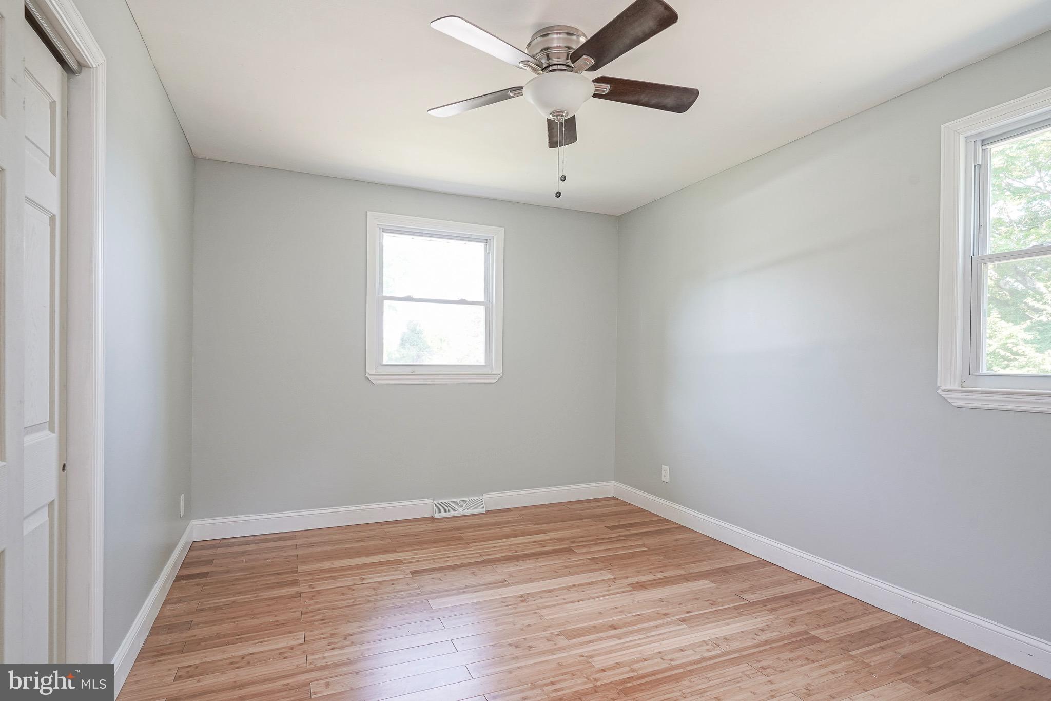 232 Egg Harbor Road Sewell, NJ 08080 - Photo 28 of 36 wooden floor in an empty room with a window