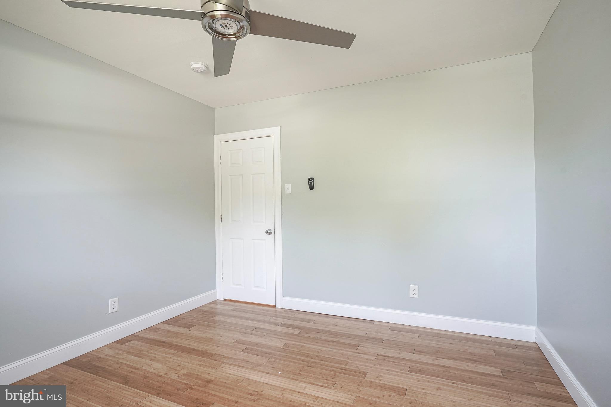232 Egg Harbor Road Sewell, NJ 08080 - Photo 31 of 36 a view of an empty room with wooden floor
