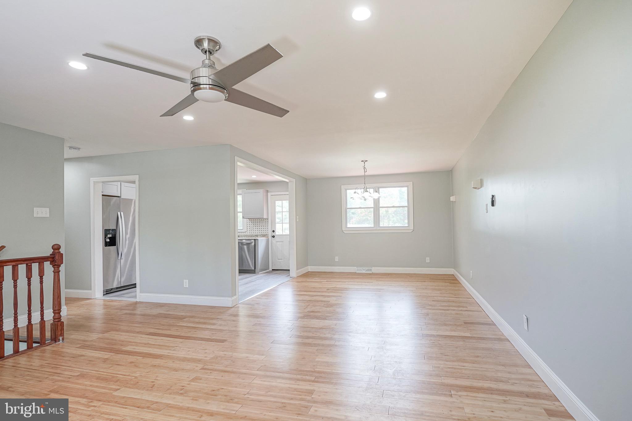 232 Egg Harbor Road Sewell, NJ 08080 - Photo 8 of 36 wooden floor in an empty room with a window
