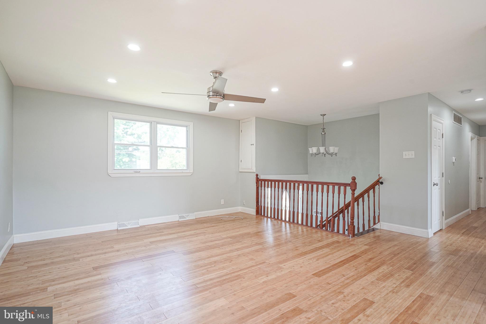 232 Egg Harbor Road Sewell, NJ 08080 - Photo 9 of 36 a view of an empty room with wooden floor and a window