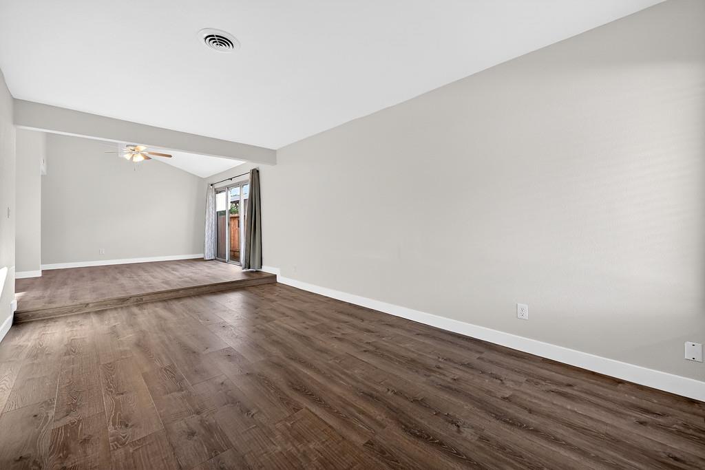 1052 Clinton Road Sacramento, CA 95825 - Photo 30 of 52 a view of empty room with wooden floor