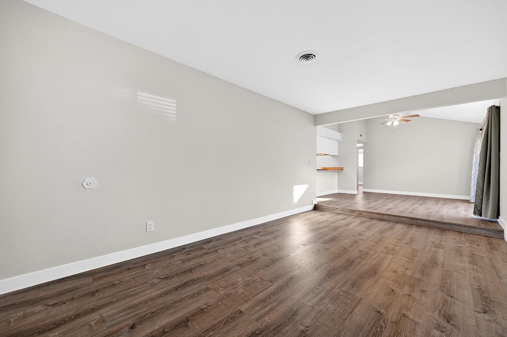 1052 Clinton Road Sacramento, CA 95825 - Photo 32 of 52 a view of empty room with wooden floor