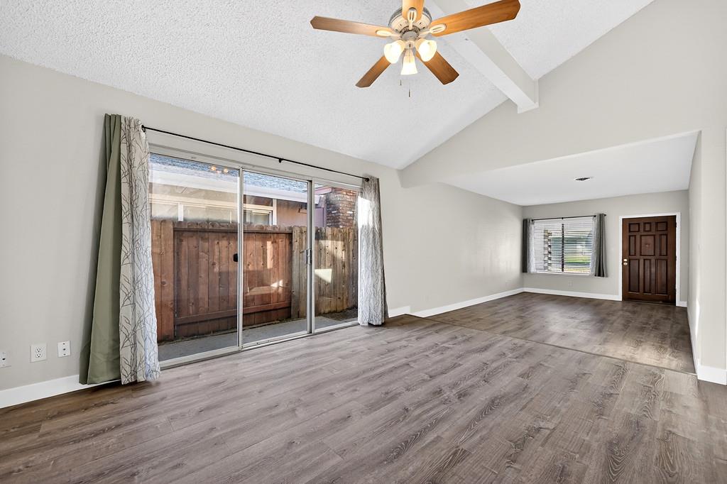 1052 Clinton Road Sacramento, CA 95825 - Photo 34 of 52 wooden floor in an empty room with a window