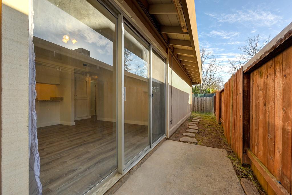 1052 Clinton Road Sacramento, CA 95825 - Photo 48 of 52 a view of a back yard with wooden floor and staircase