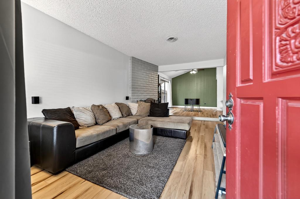 1052 Clinton Road Sacramento, CA 95825 - Photo 6 of 52 a living room with furniture and a rug