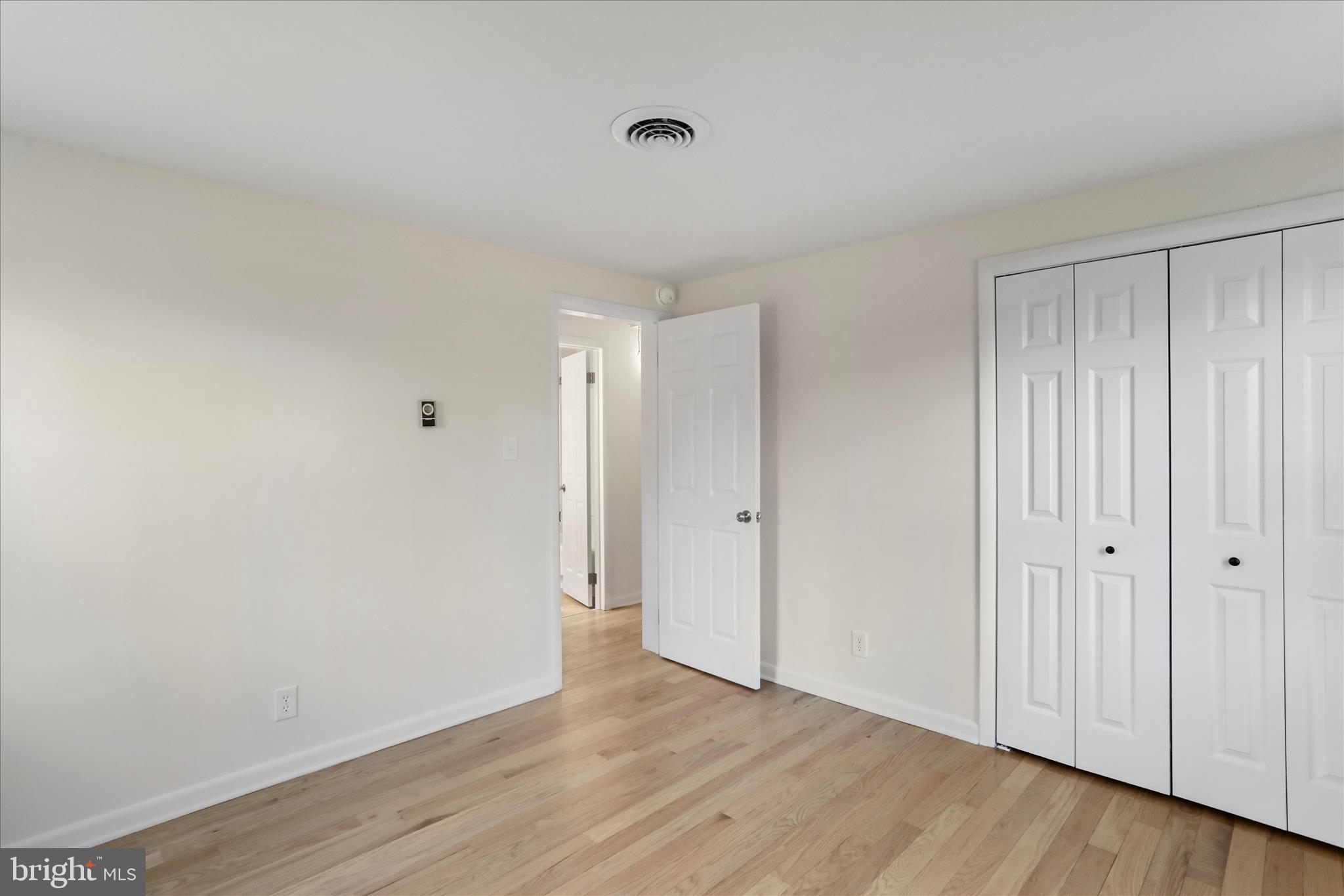 13 Oriole Circle Berkeley Springs, WV 25411 - Photo 22 of 36 a view of an empty room with wooden floor