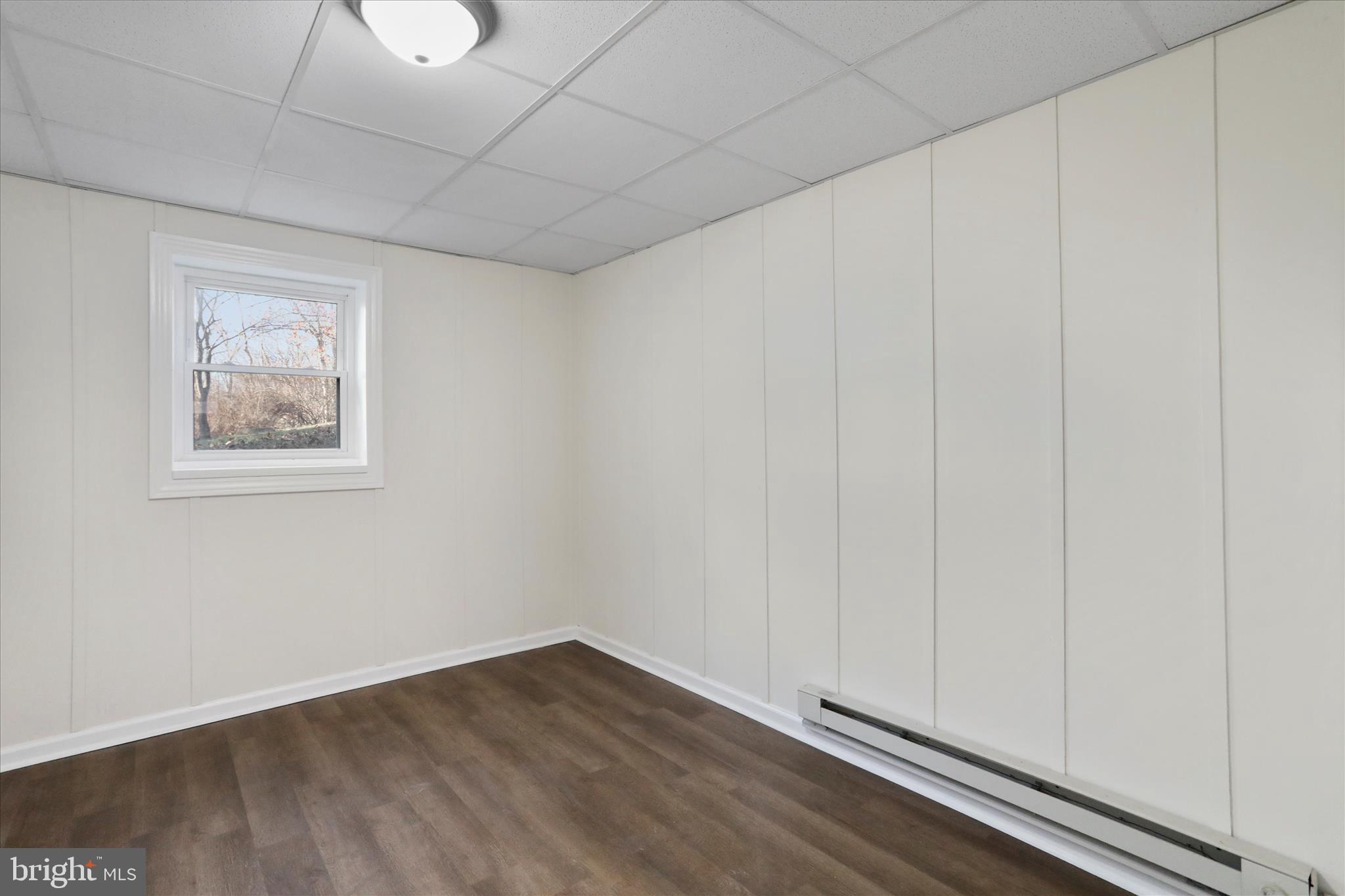 13 Oriole Circle Berkeley Springs, WV 25411 - Photo 34 of 36 a view of an empty room and wooden floor