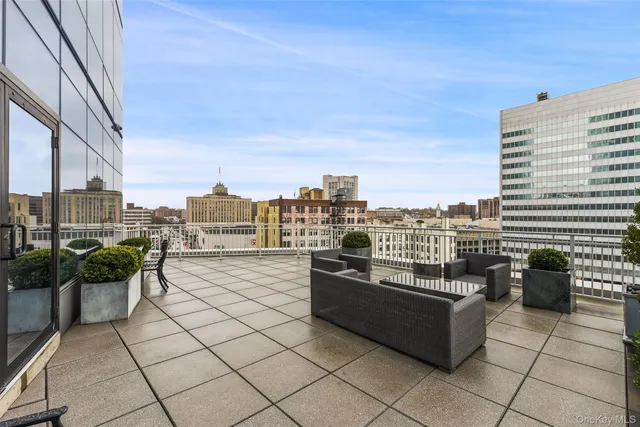 a view of a terrace with seating space
