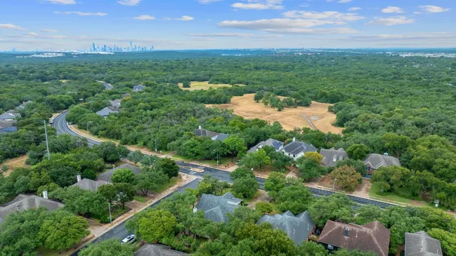a view of a lake with a city