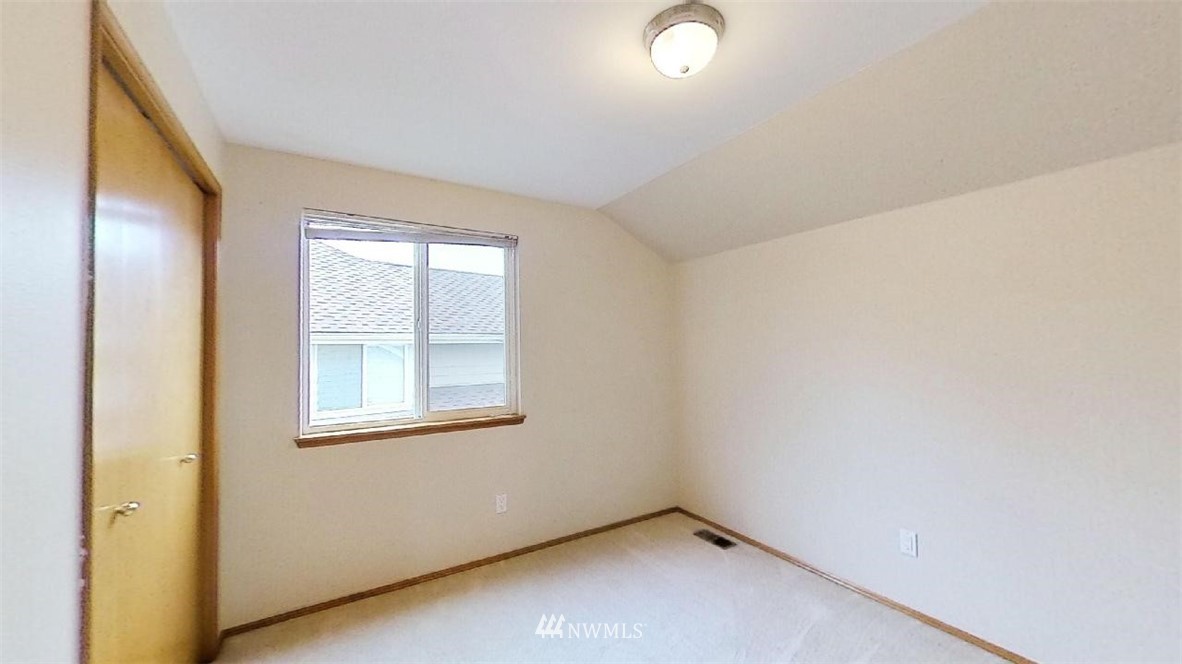18607 104th Place Southeast Renton, WA 98055 - Photo 14 of 22 an empty room with a window