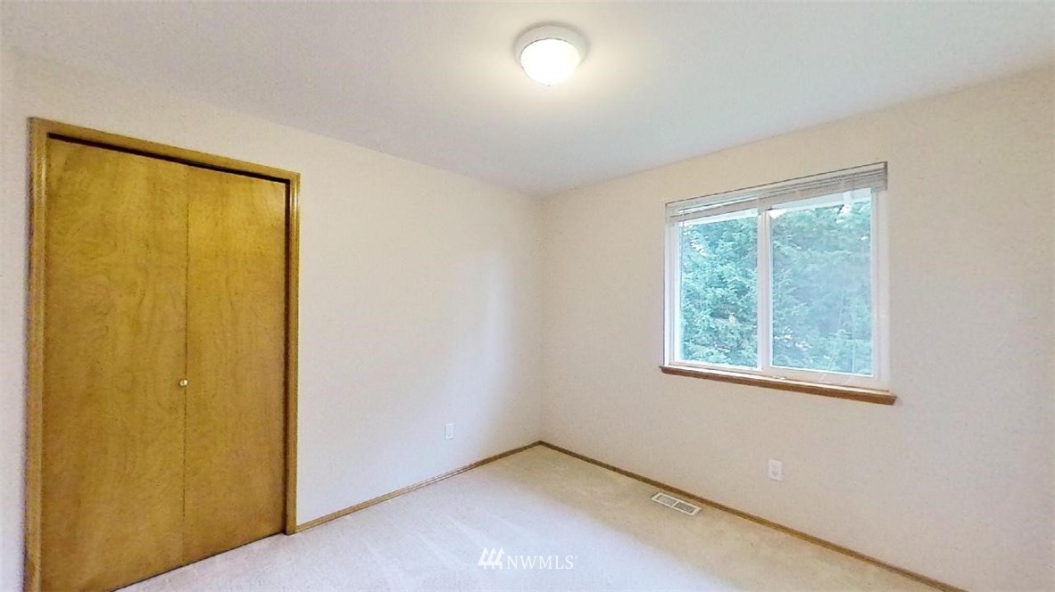 18607 104th Place Southeast Renton, WA 98055 - Photo 15 of 22 an empty room with windows