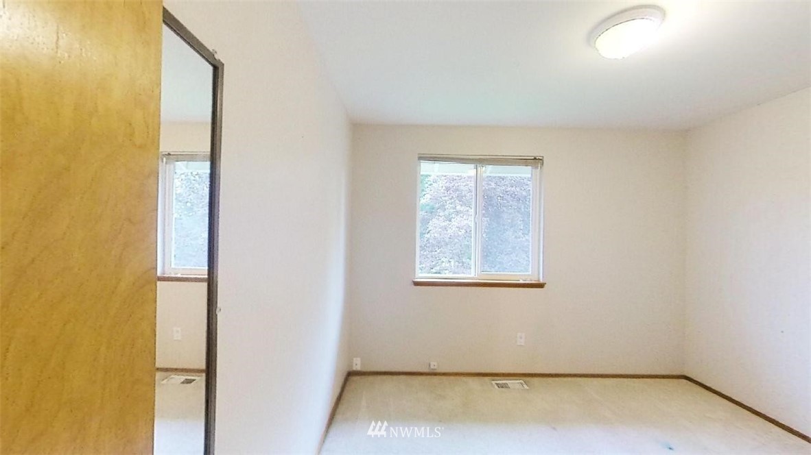 18607 104th Place Southeast Renton, WA 98055 - Photo 16 of 22 an empty room with a window