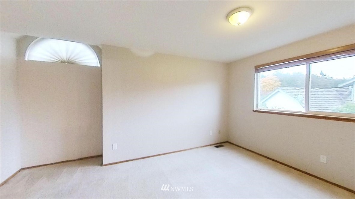 18607 104th Place Southeast Renton, WA 98055 - Photo 19 of 22 an empty room with a window