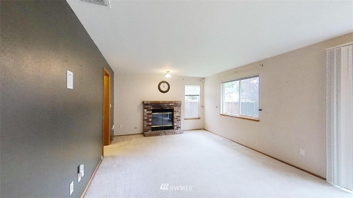 18607 104th Place Southeast Renton, WA 98055 - Photo 10 of 22 a view of livingroom with furniture and a window