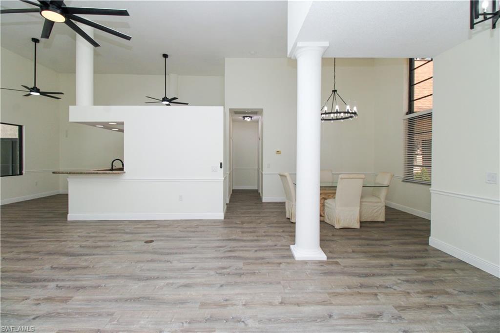 311 31st Street Northwest Naples, FL 34120 - Photo 34 of 50 a view of a kitchen with wooden floor