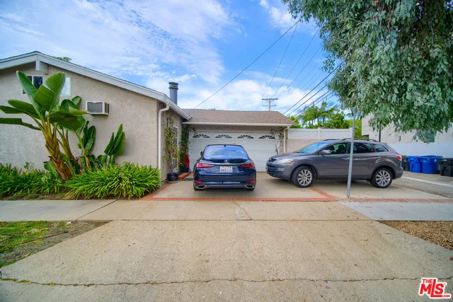 a car parked in front of a house