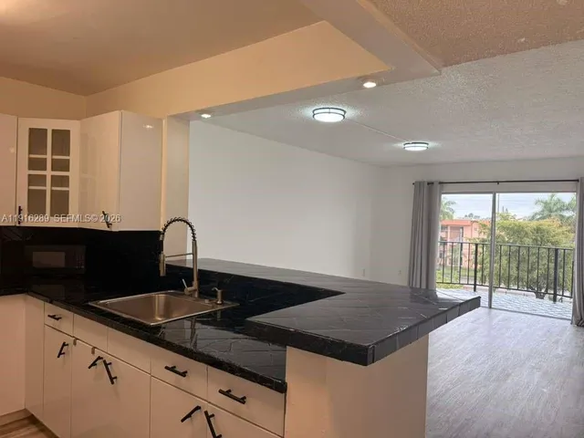 $1,749 | 5201 Northwest 7th Street, Unit 405, Miami, FL 33126