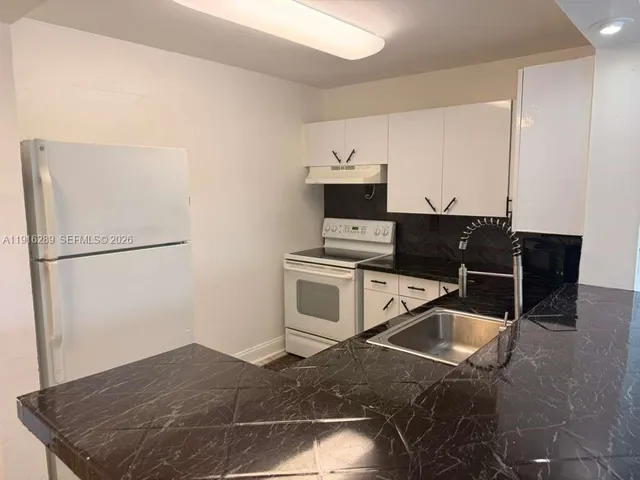 $1,749 | 5201 Northwest 7th Street, Unit 405, Miami, FL 33126