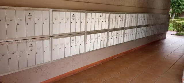 a view of wooden floor with staircase
