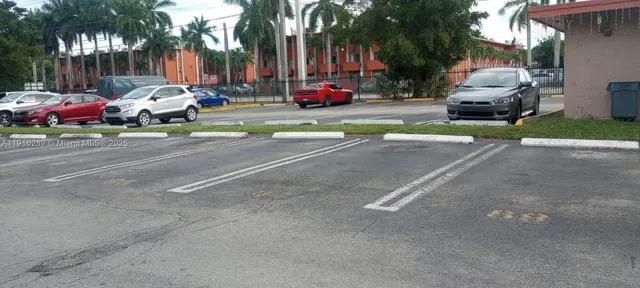 a car parked in front of a house