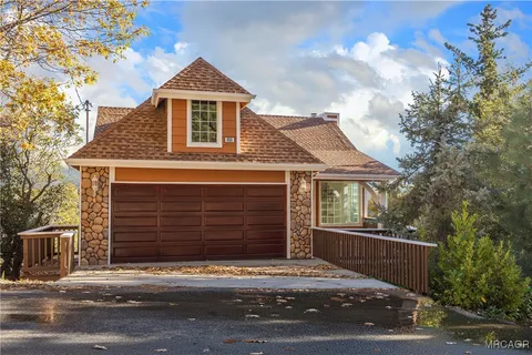 a front view of a house with a garage